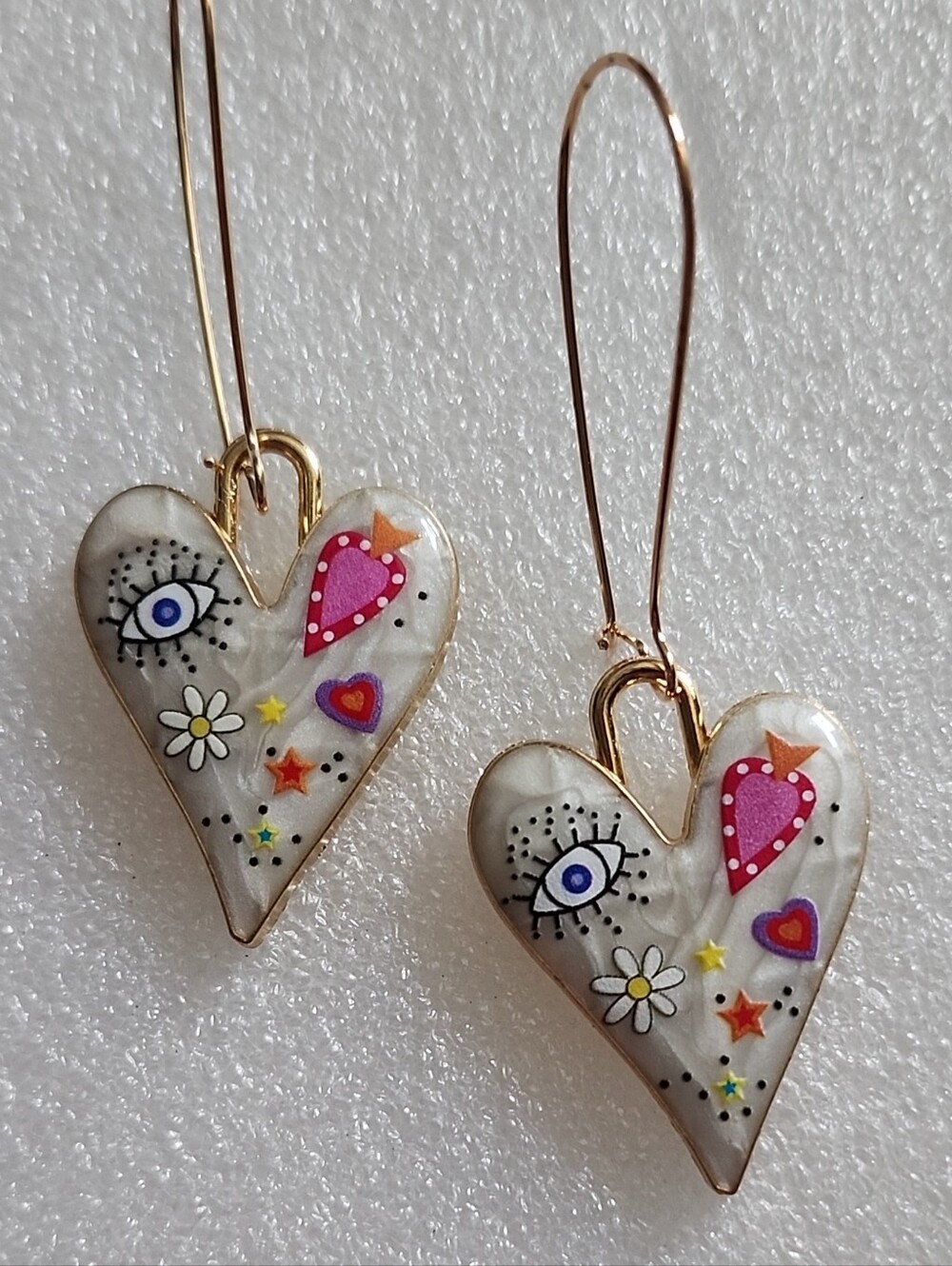 Hand Crafted White Heart Drop Earrings with Colorful Motifs